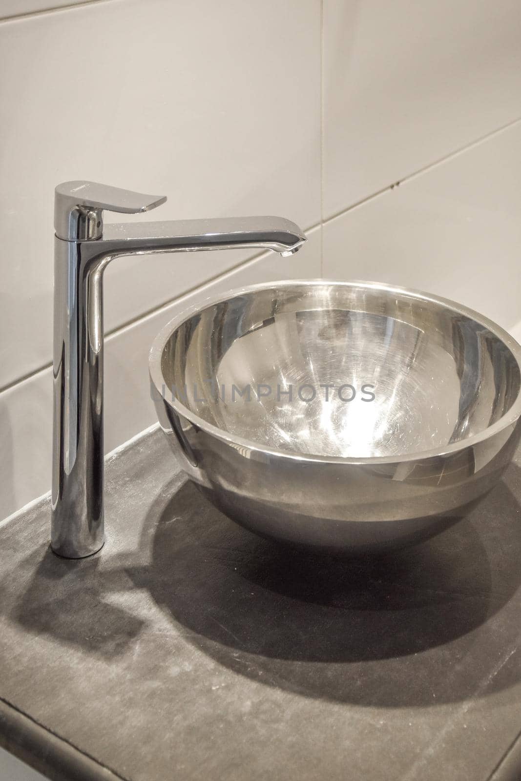 Close up of luxury faucet in an elegant bathroom