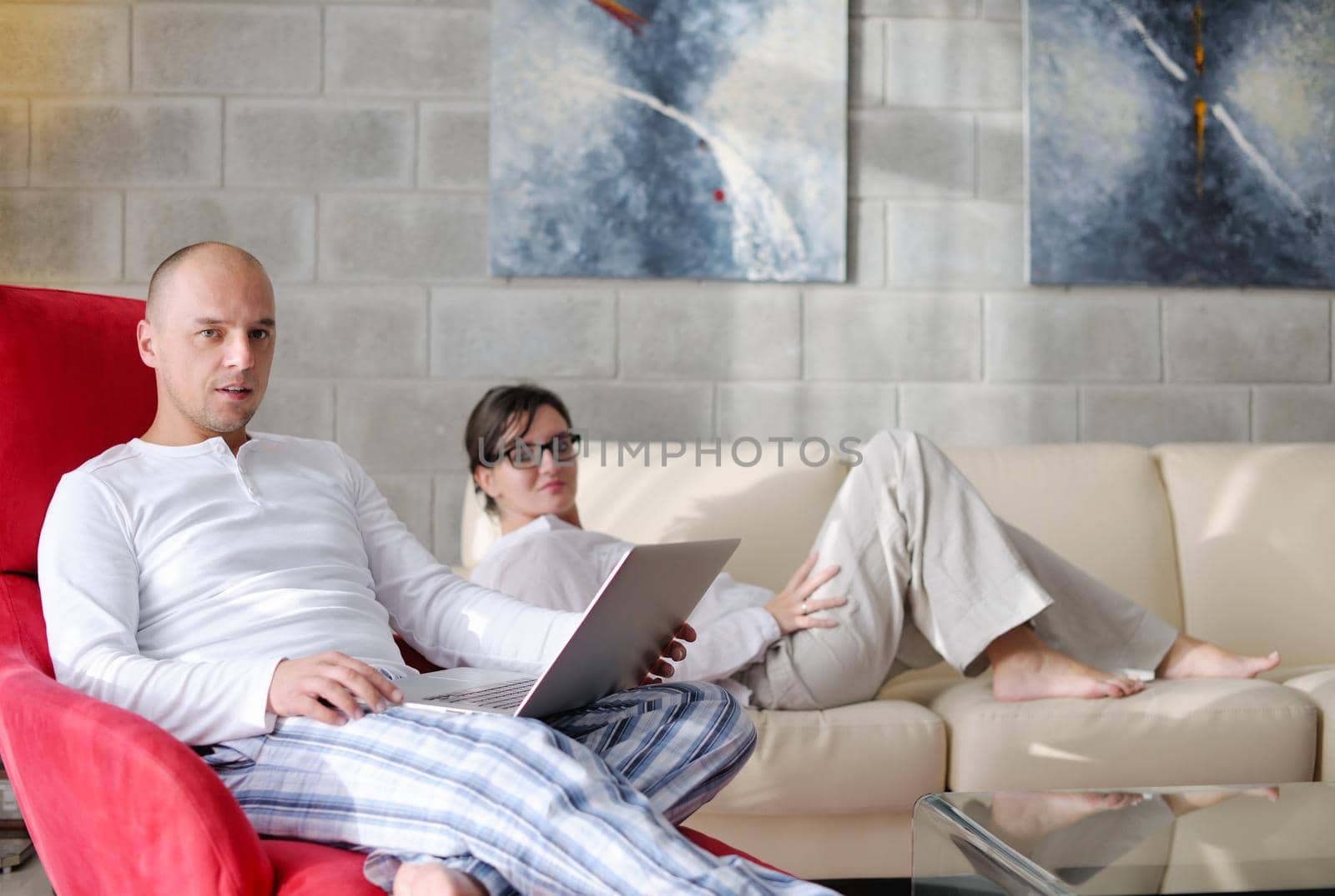 happy young  Couple Using Laptop computer At Home