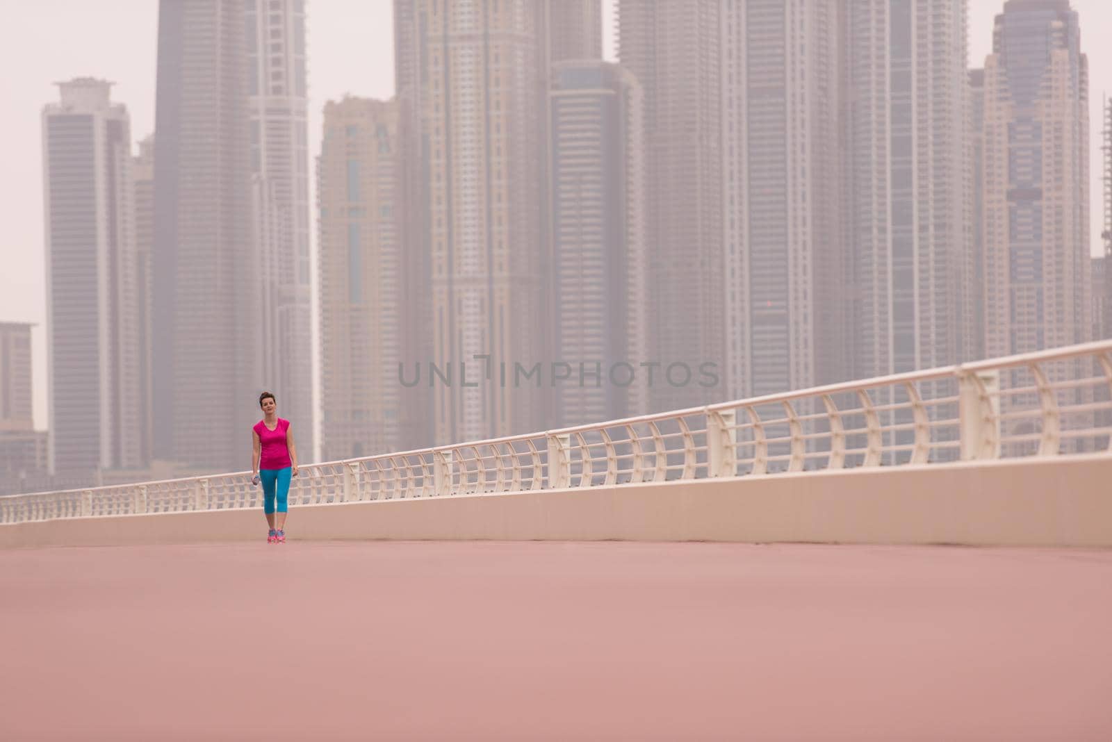 woman running on the promenade by dotshock