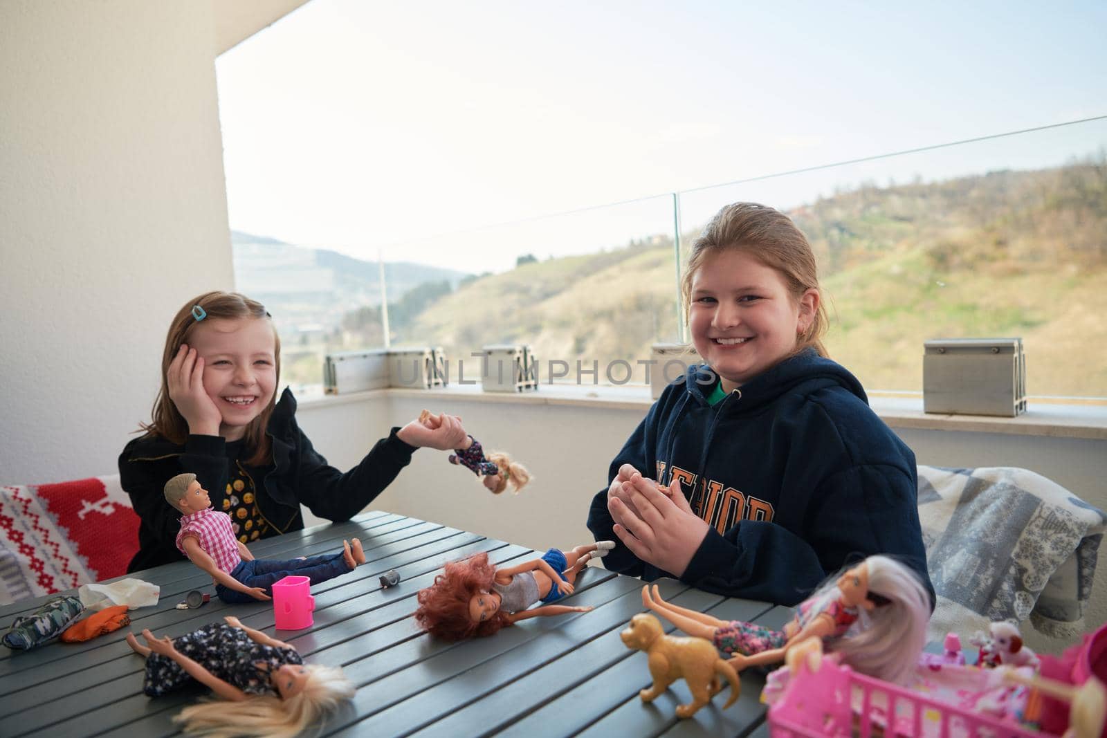 little girls playing with dolls by dotshock
