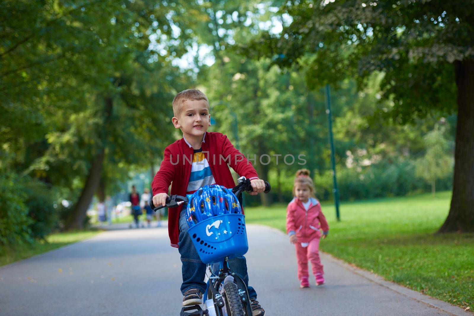 boy and girl with bicycle by dotshock