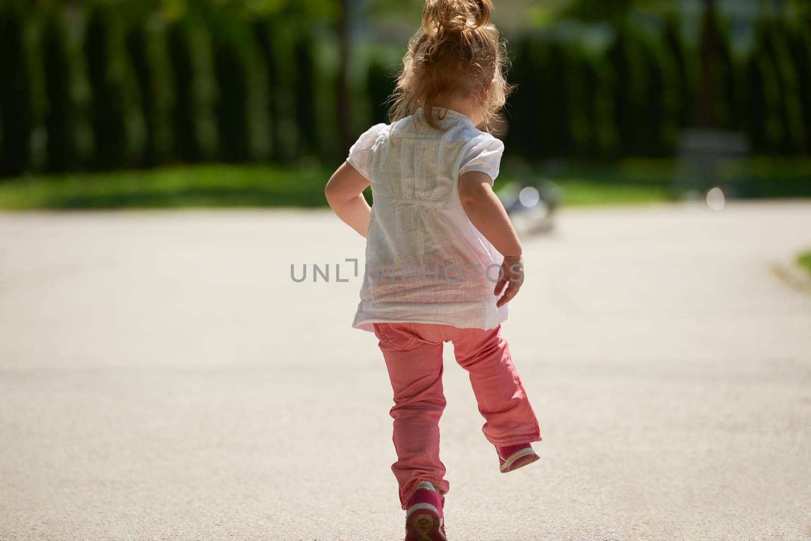 happy  little girl have fun in park