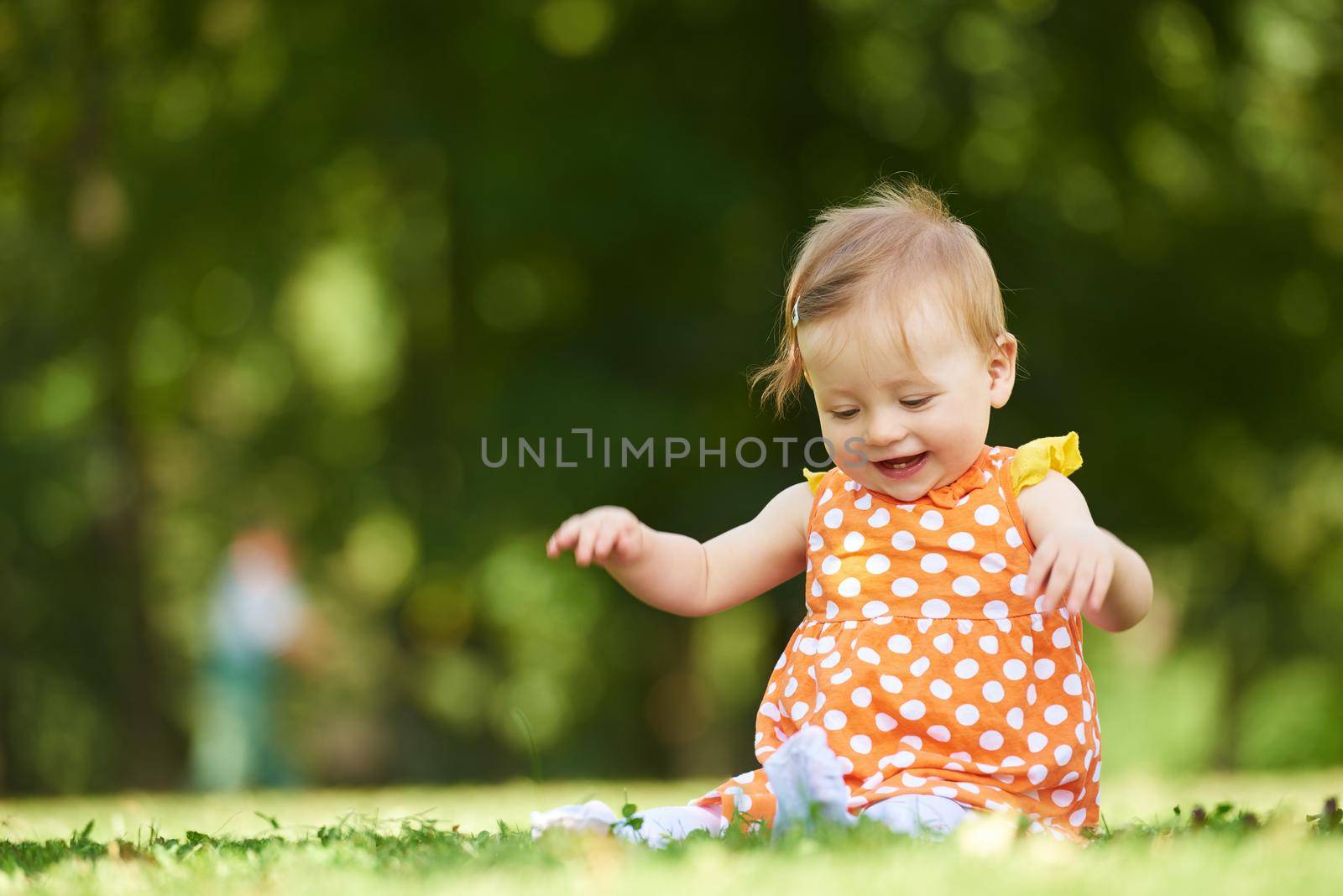 baby in park by dotshock
