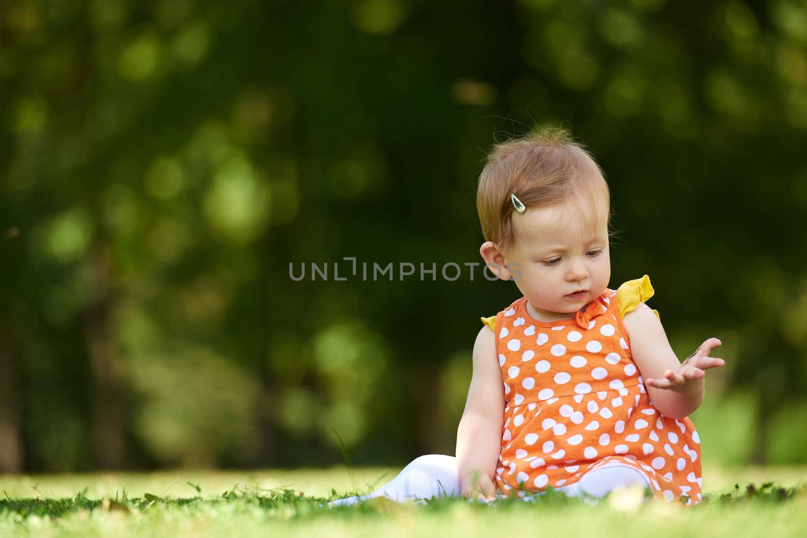 baby in park by dotshock