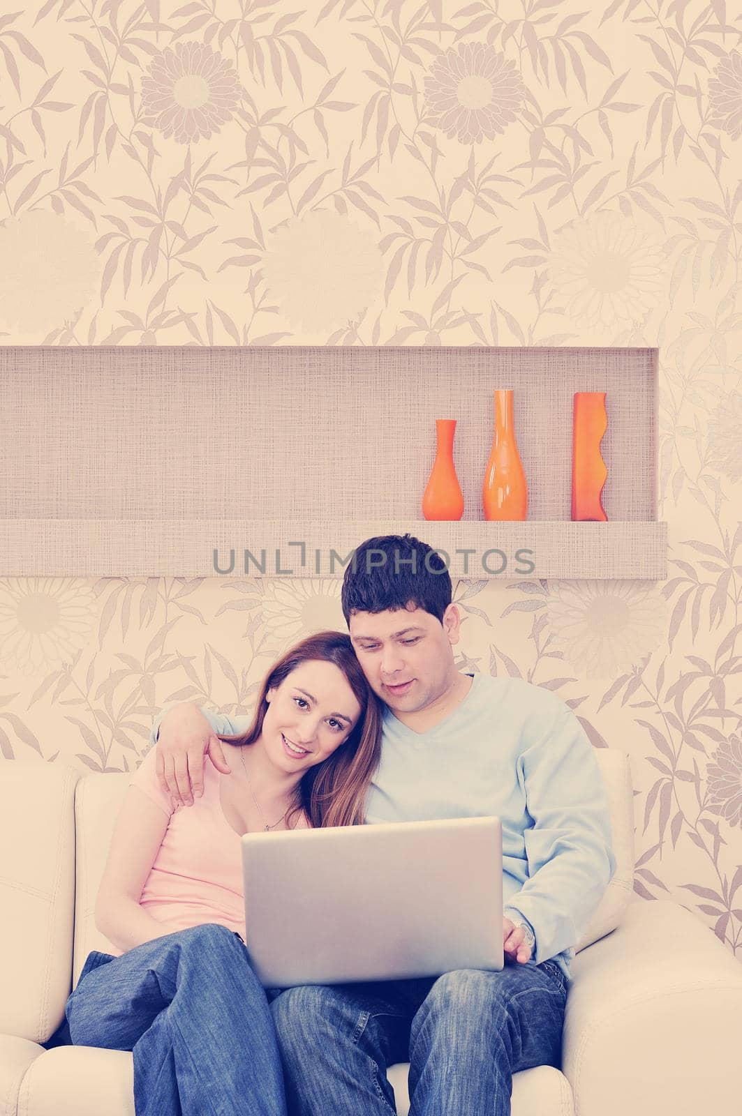 young couple at home with  modern livingroom indoor working on laptop on house finance and planing