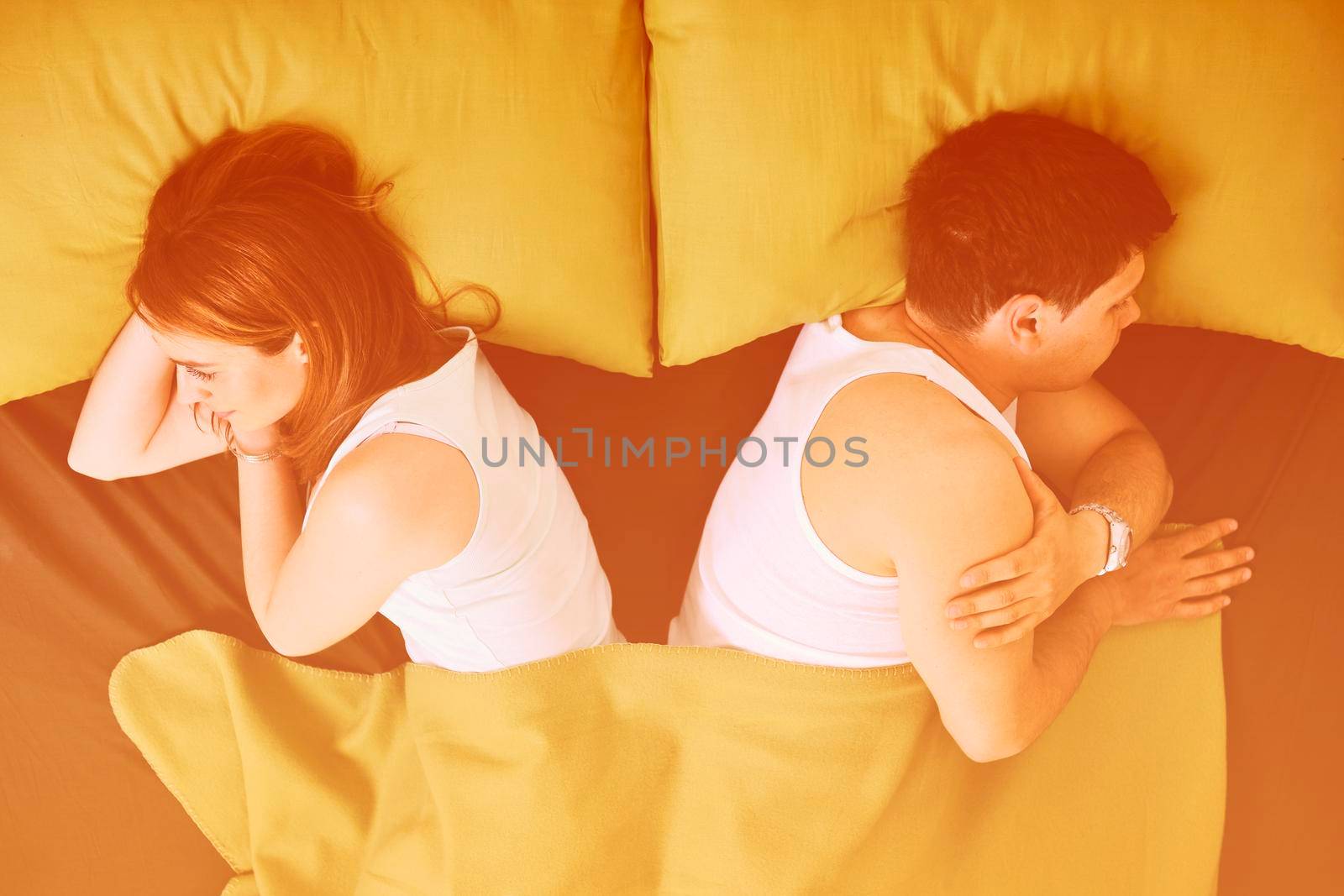 happy young couple in bed at morning