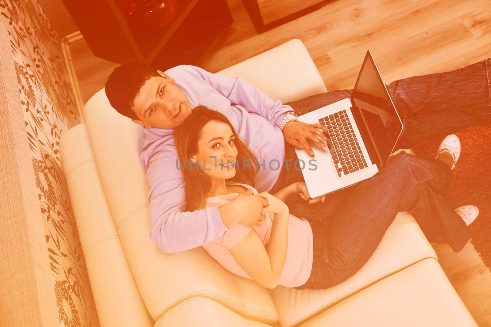 young couple at home with  modern livingroom indoor working on laptop on house finance and planing