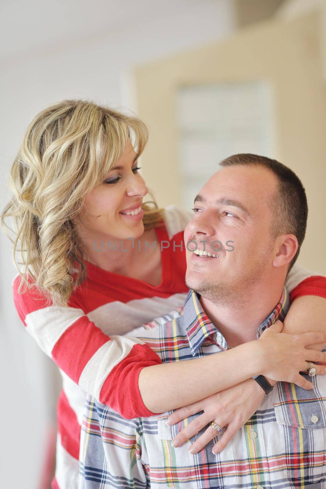 happy young adults portrait at home indoors