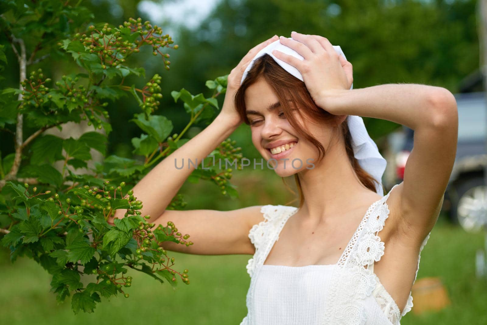 Woman in white dress countryside village nature ecology. High quality photo