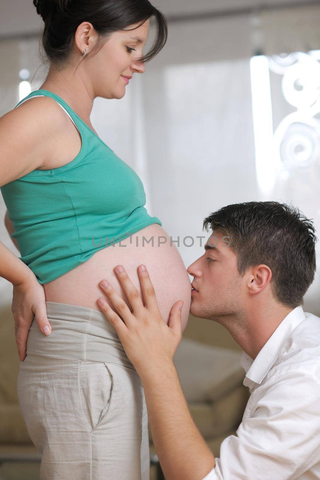 happy young cuple, pregnant woman