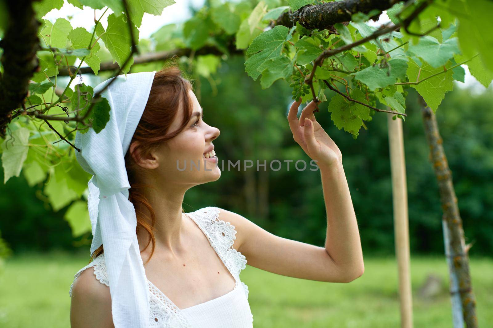 woman with white headband countryside nature garden agriculture. High quality photo