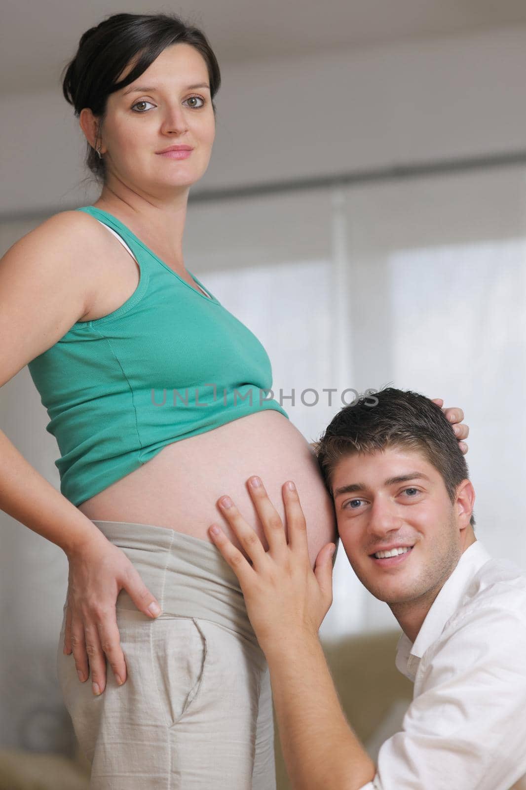 happy young cuple, pregnant woman