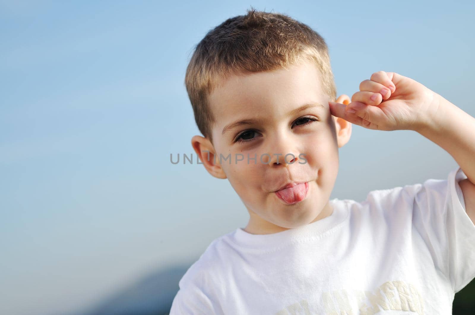 happy young boy child outdoor portrait