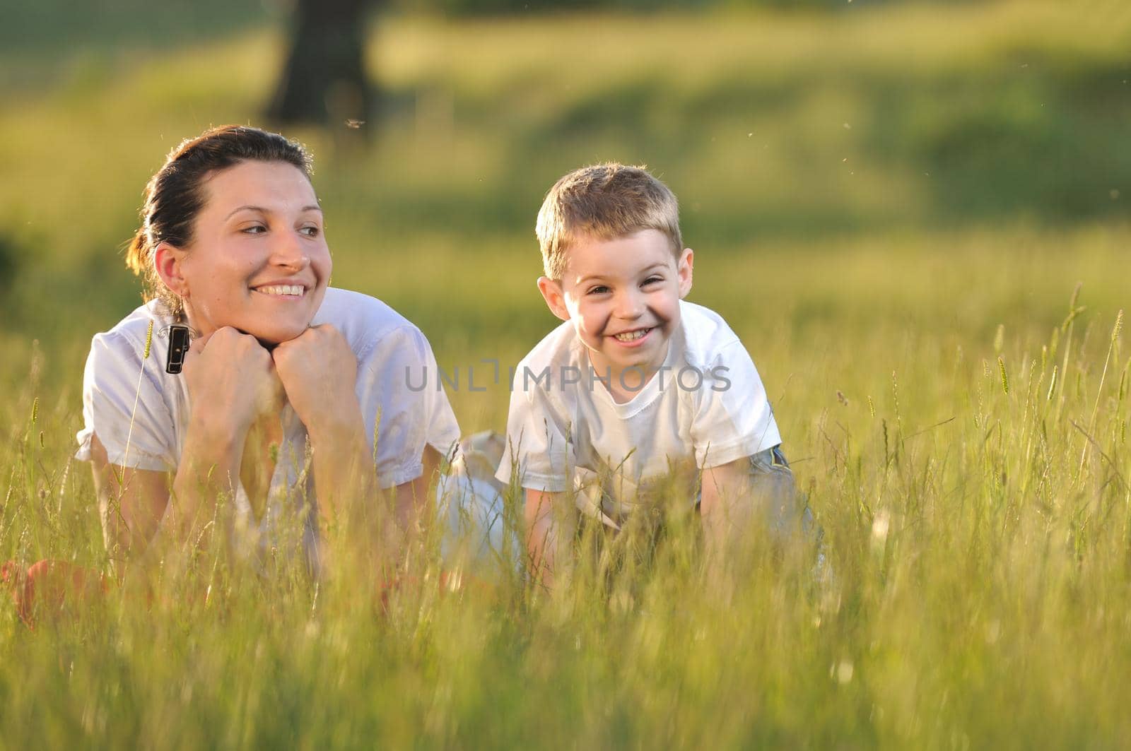 happy young woman mother play and outdoor with beautiful child 