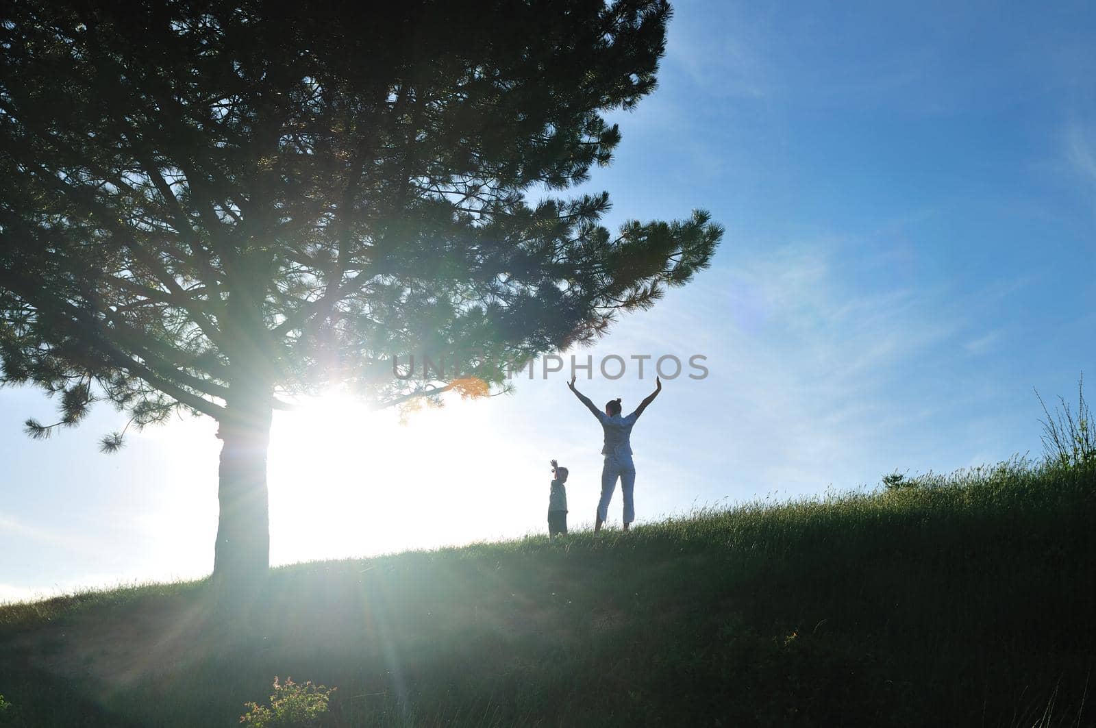 happy young woman mother play and outdoor with beautiful child