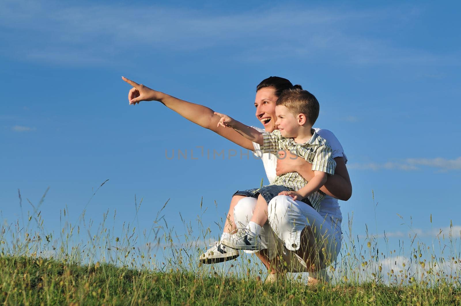 happy young woman mother play and outdoor with beautiful child 