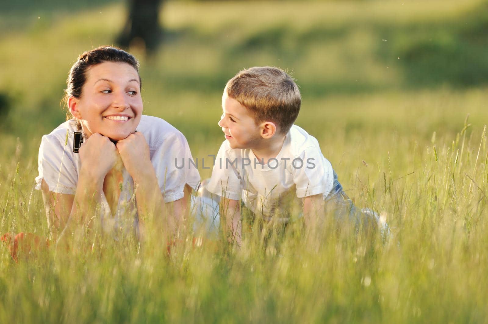 happy young woman mother play and outdoor with beautiful child 