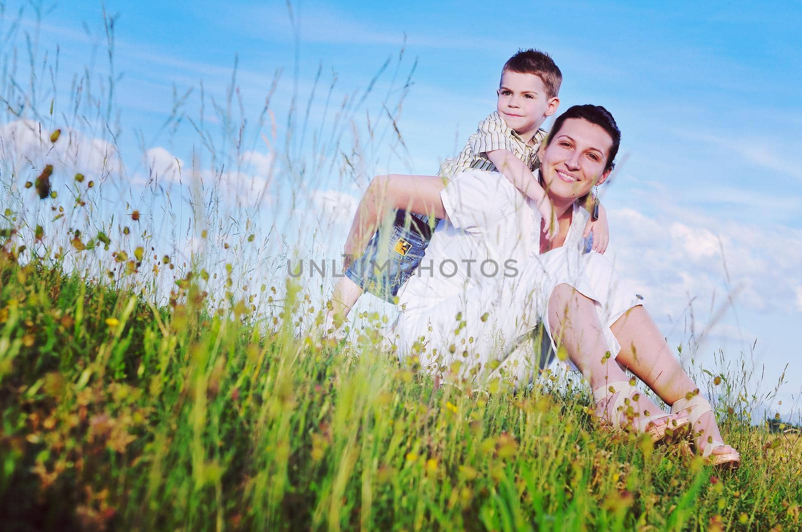 happy young woman mother play and outdoor with beautiful child 