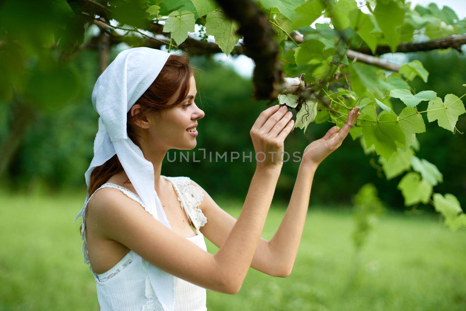 Woman in white dress countryside village nature ecology. High quality photo