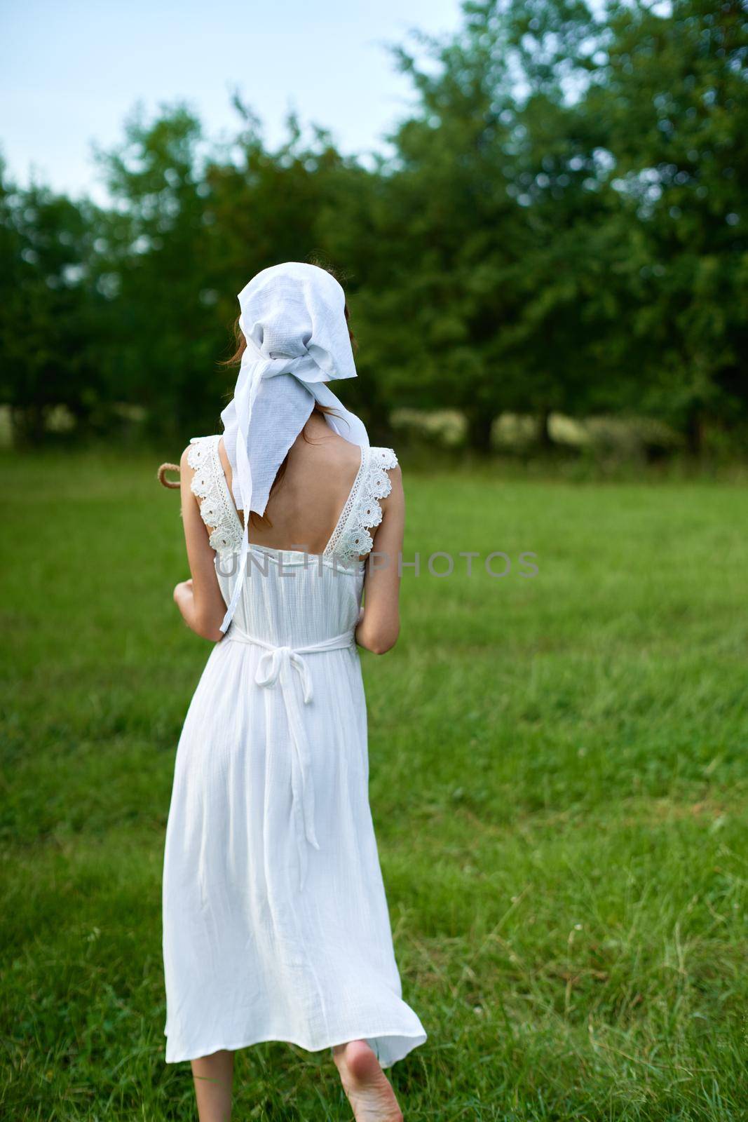 Woman in white dress countryside village nature ecology by Vichizh