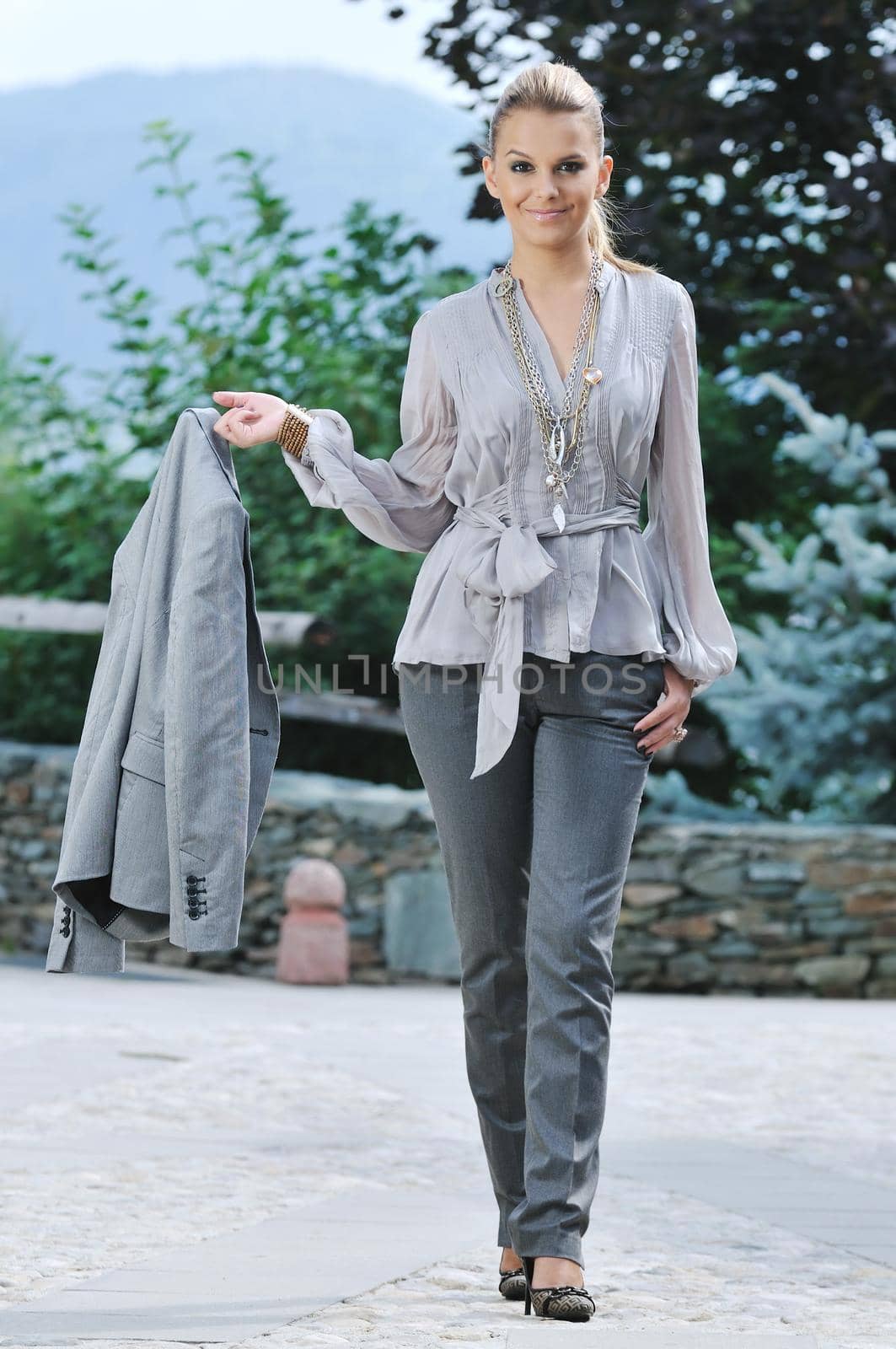 young woman posing in fashion  business and caual clothing outdoor