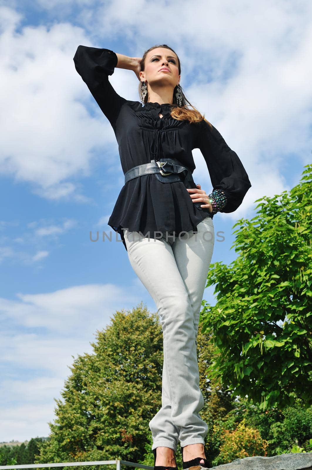 young woman posing in fashion  business and caual clothing outdoor