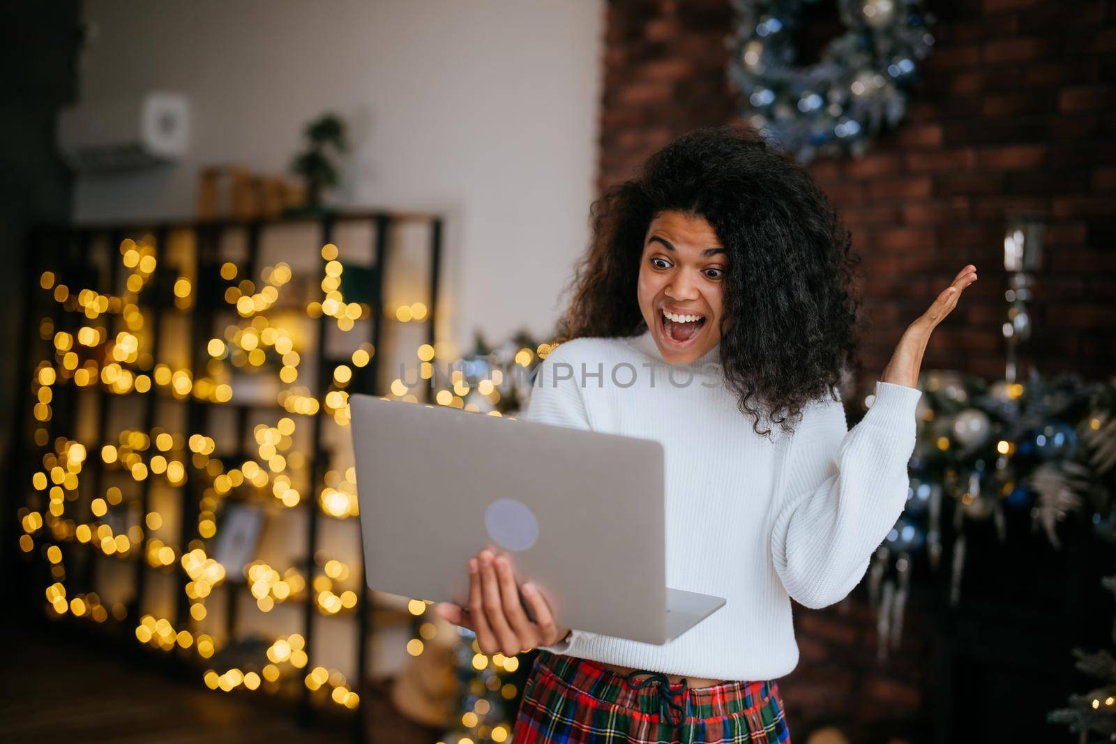 Nice attractive lovely overjoyed crazy woman holding in hands laptop, goal achievement by teksomolika