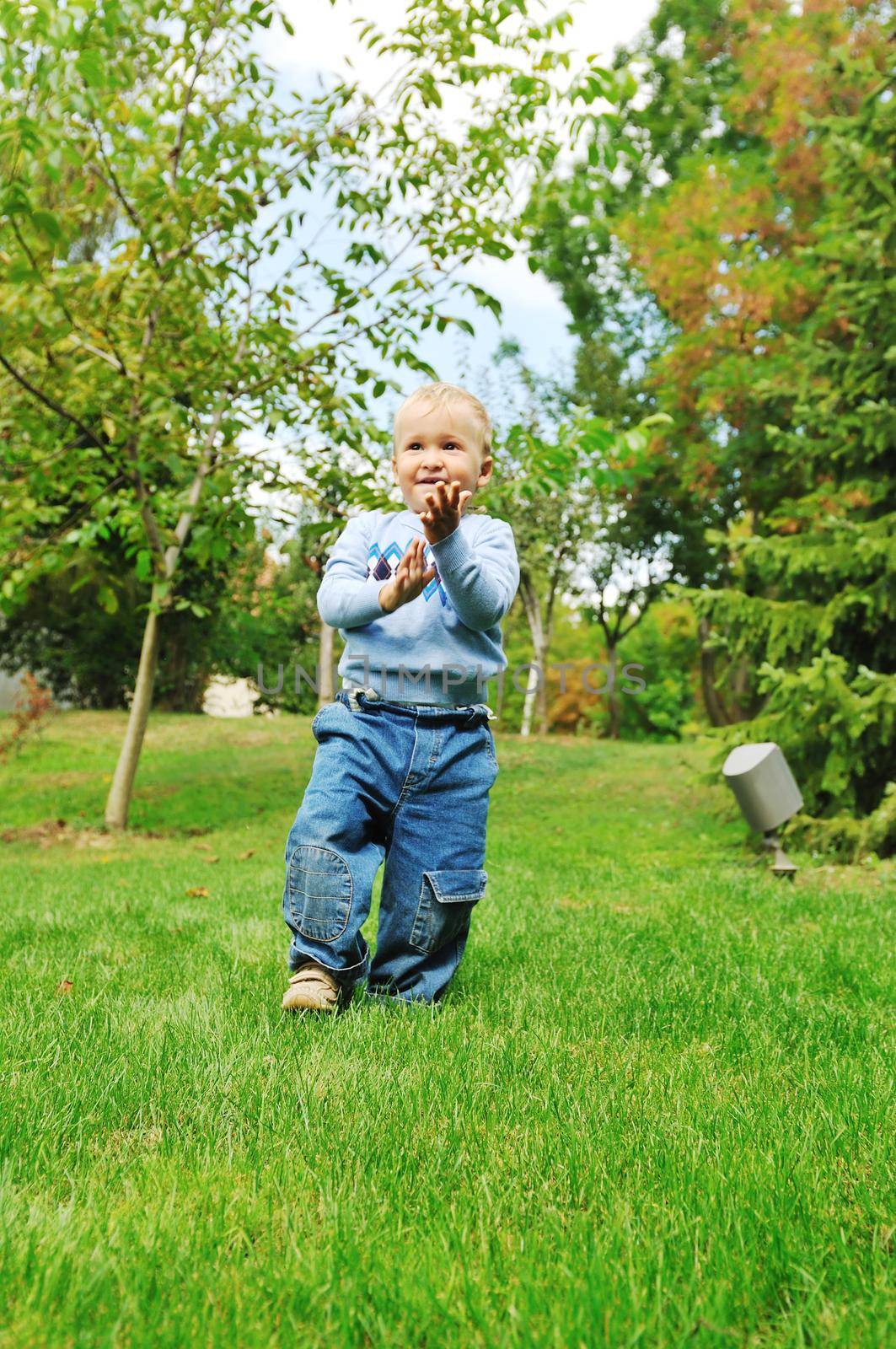 beautiful children  posing in fashionable clothing outdoor