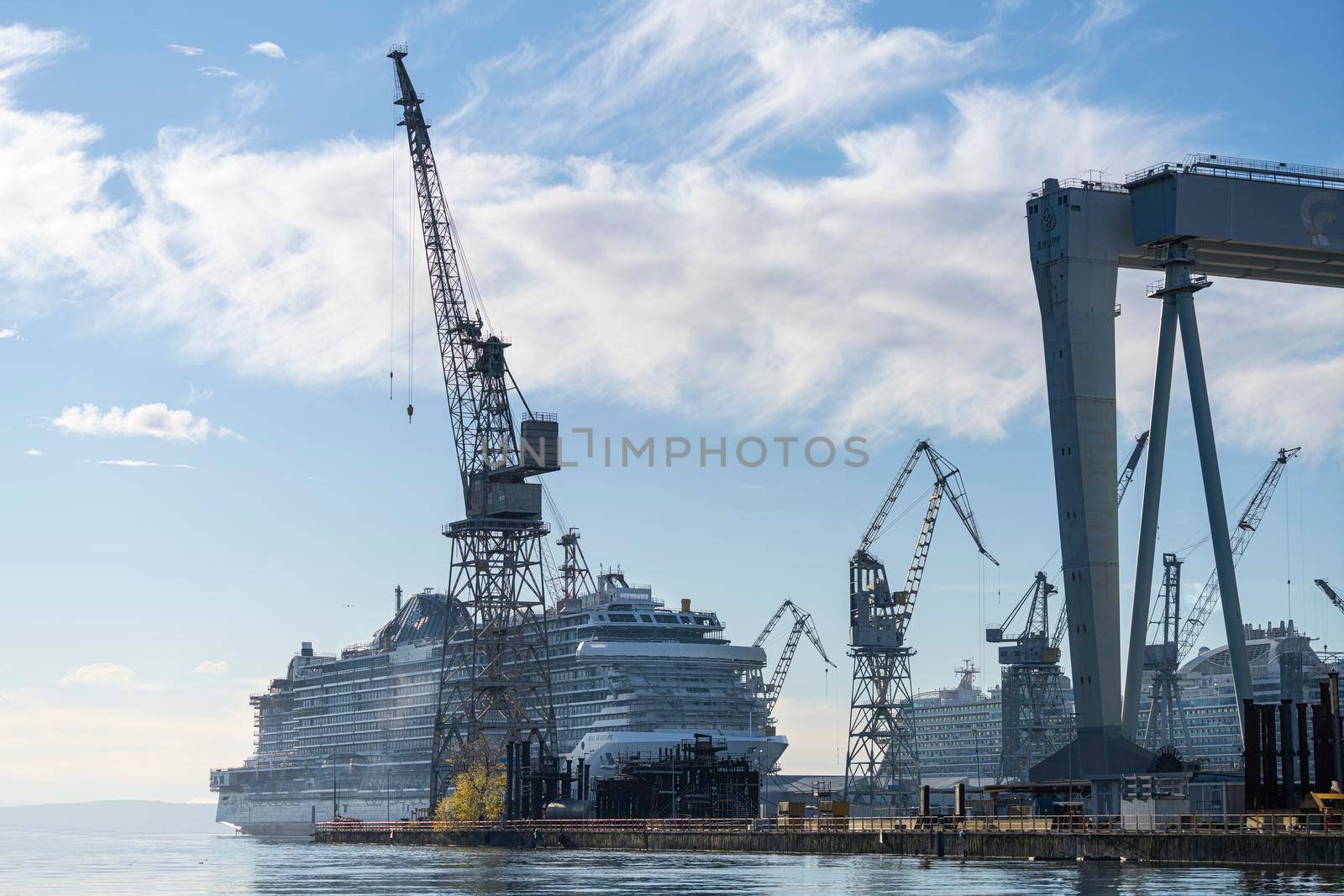 Monfalcone, Italy. December 2021.  view of a large cruise ship under construction in a shipyard