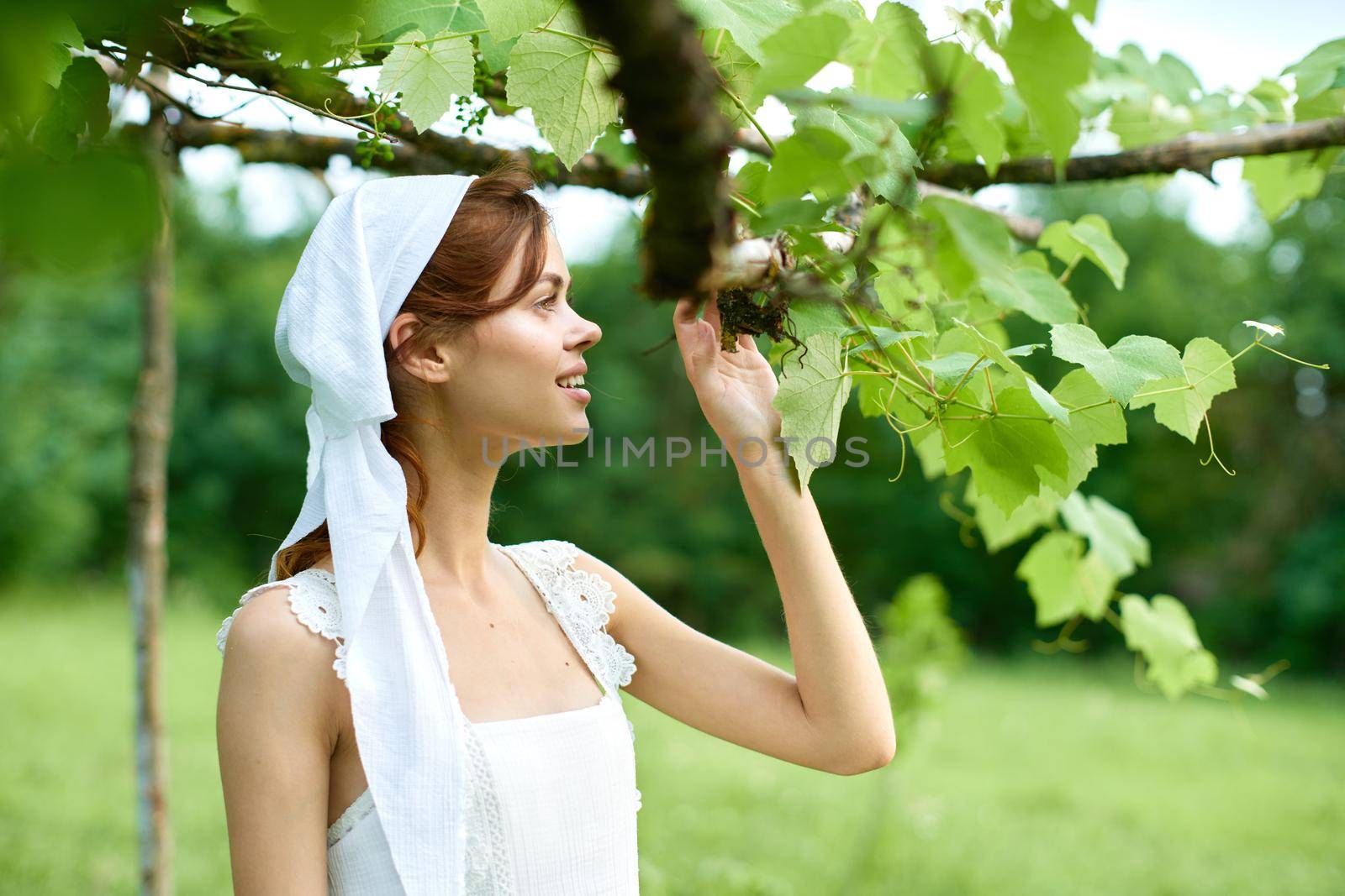 Woman in white dress countryside village nature ecology. High quality photo