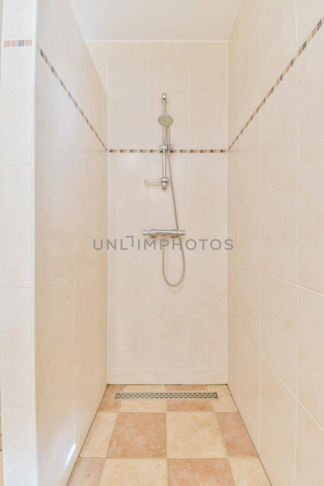 Lovely bathroom with tiled floor and walk-in shower
