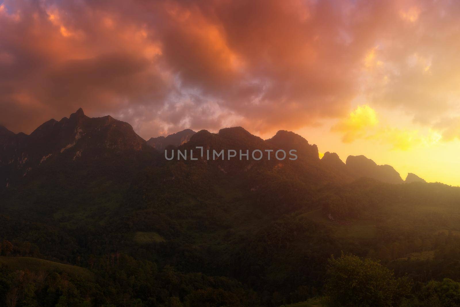 Panorama view of Doi Luang Chiang Dao mountain during sunset,The famous mountain for tourist to visit in Chiang Mai,Thailand. by Nuamfolio