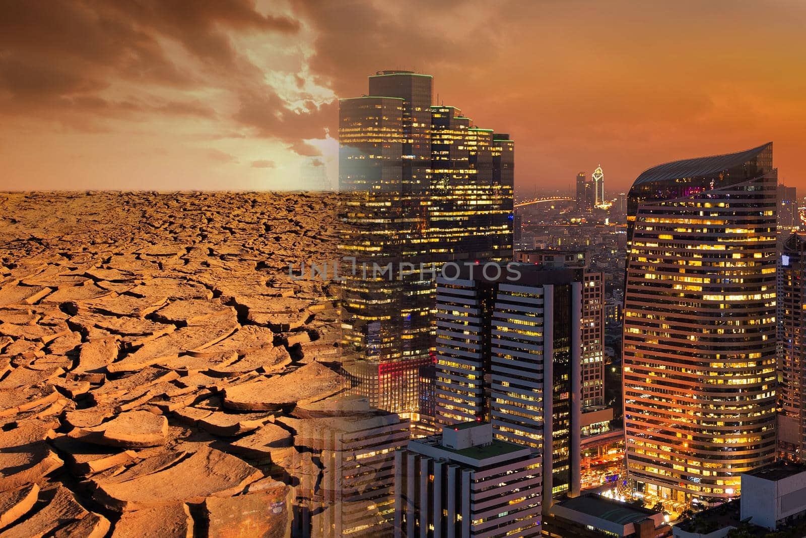 Modern city looks over a cracked earth landscape for global Warming and pollution theme concept