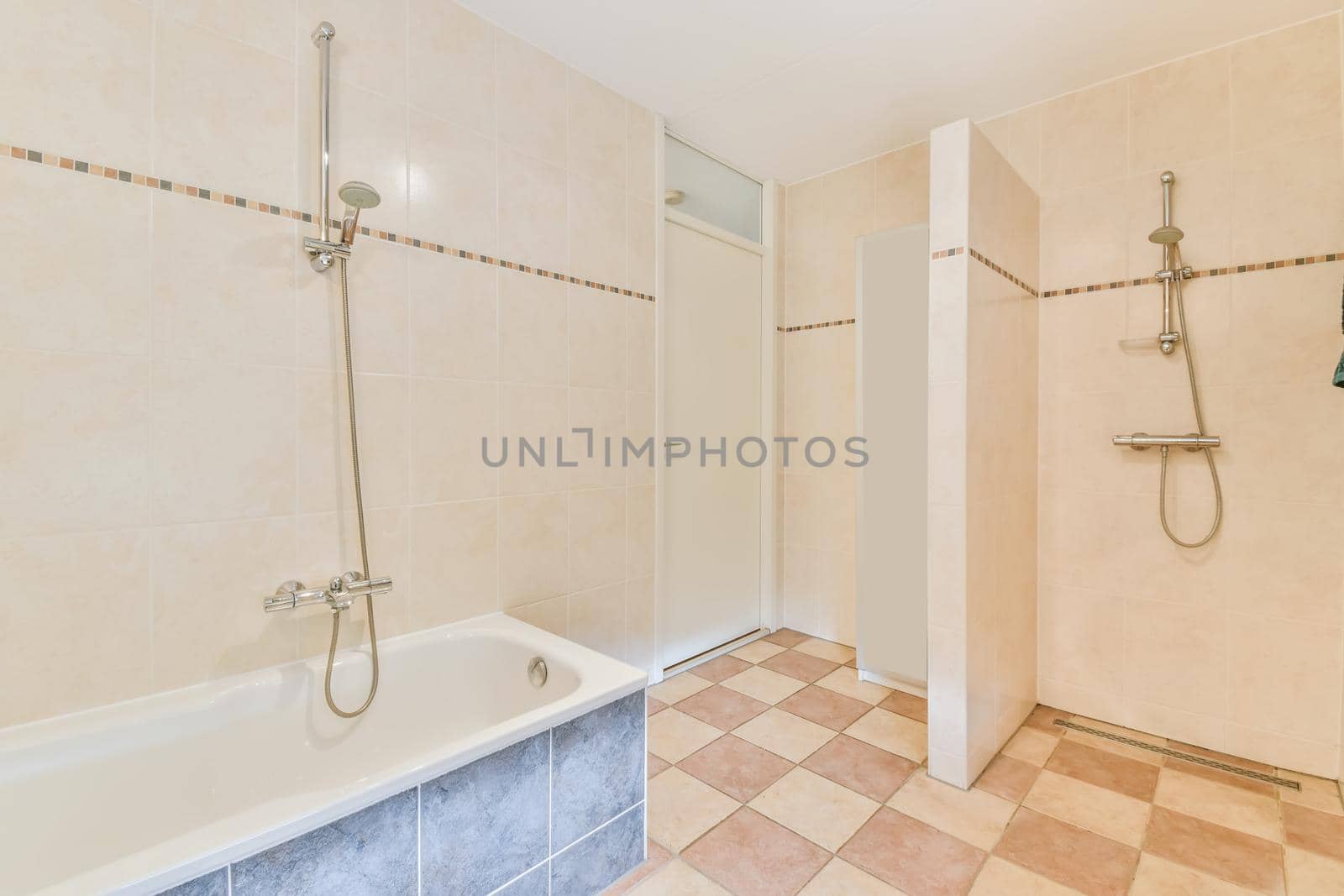 Lovely bathroom with tiled floors and a comfortable bathtub