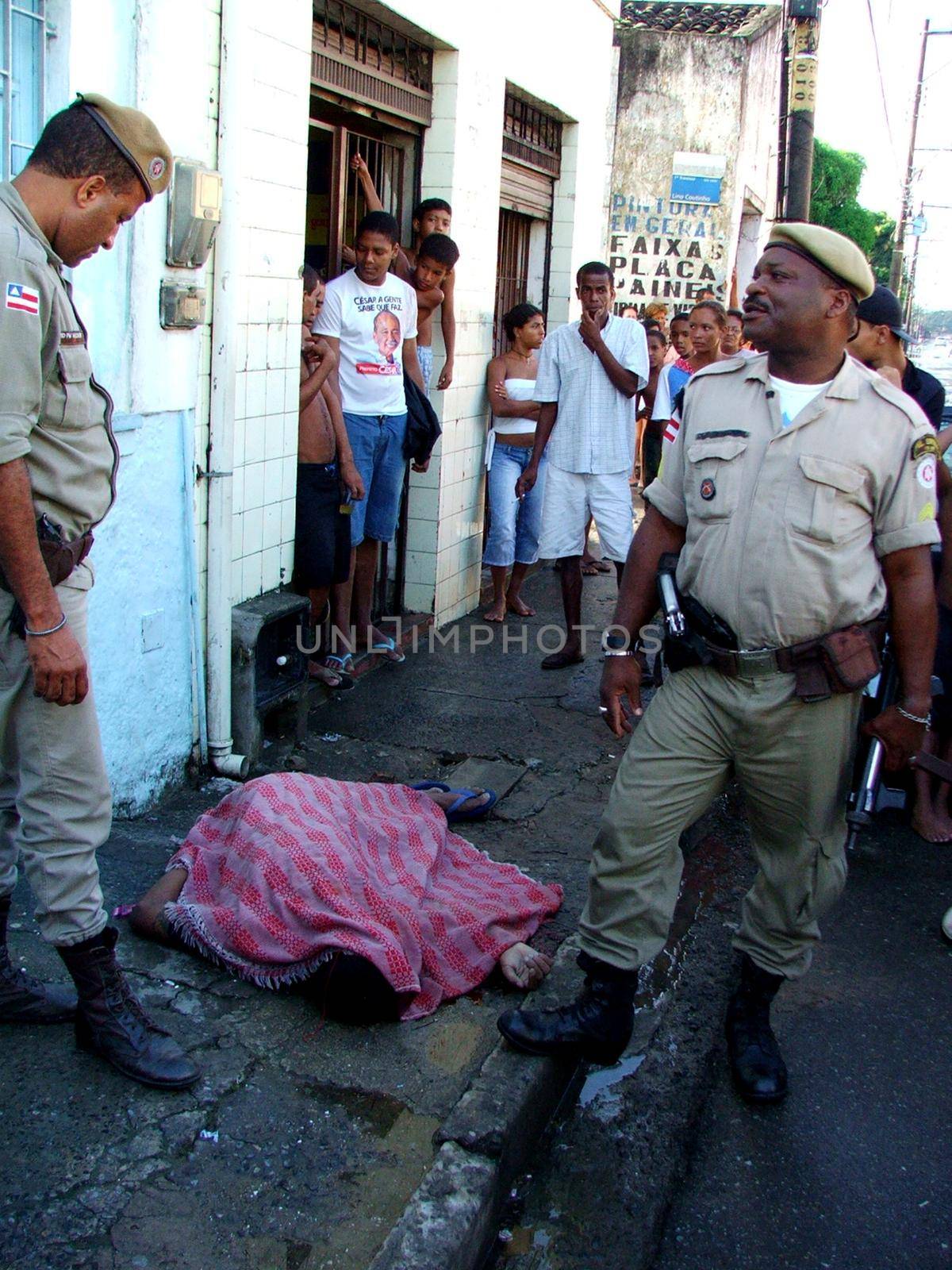 salvador, bahia, brazil - may 25, 2005: Black man is murdered in the street of the city of Salvador.