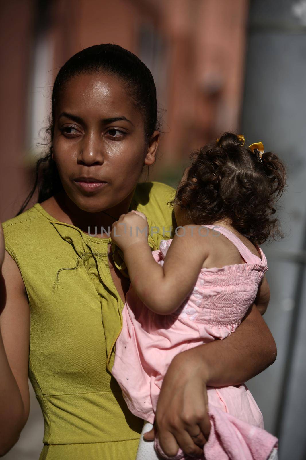 mother with daughter with microcephaly by joasouza