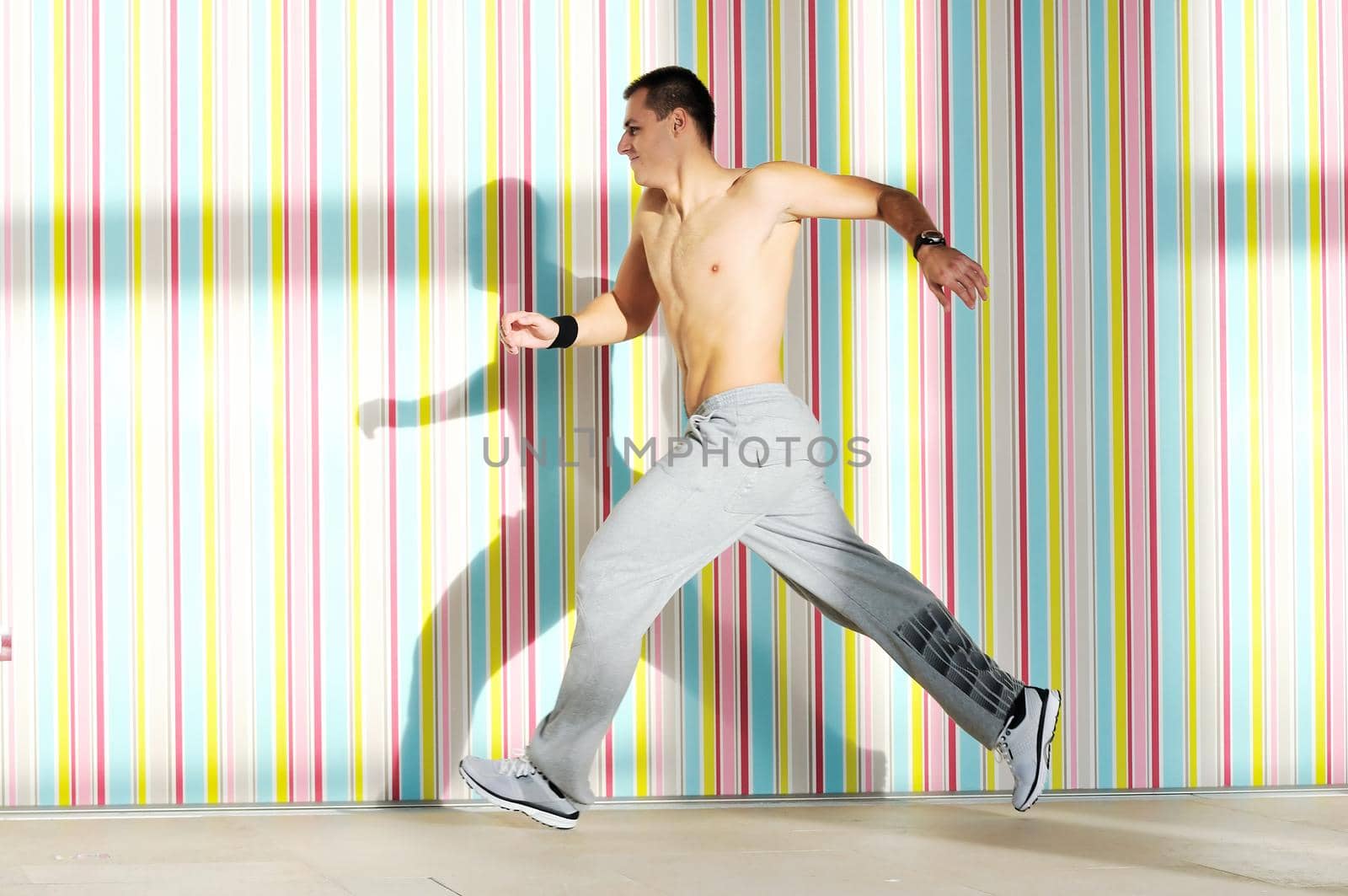 one young healthy man exercice fitness recreation and jump in air