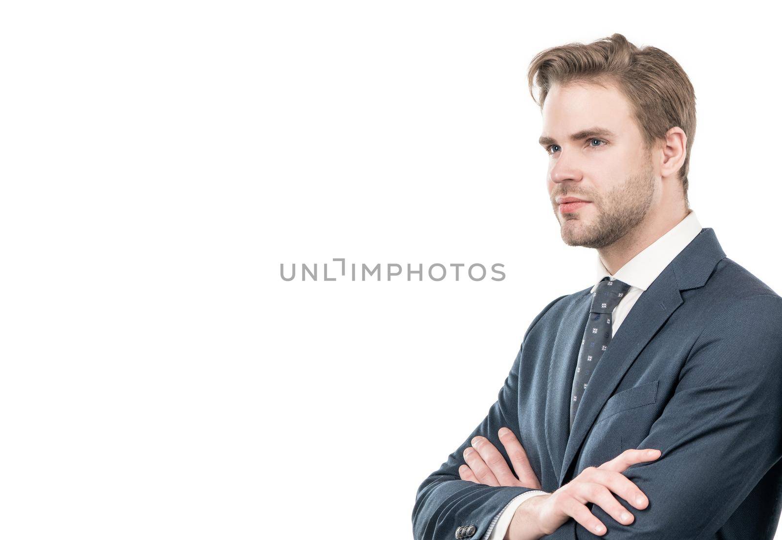 Serious confident guy in formal suit keep arms crossed isolated on white copy space, manager by RedFoxStudio