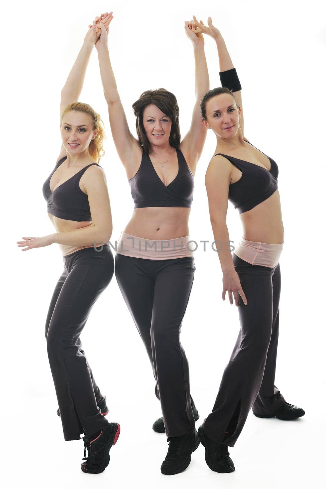 group of young woman isolaed on white exercising fitness