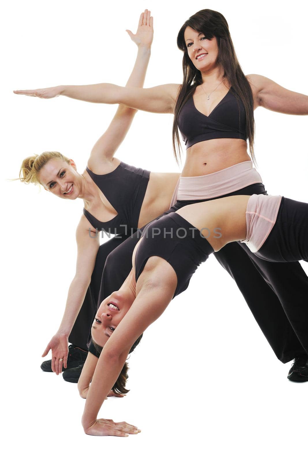 group of young woman isolaed on white exercising fitness