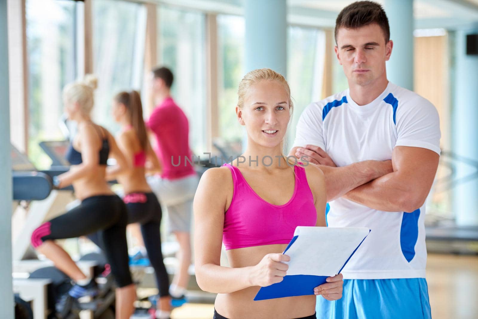 people group in fitness gym by dotshock