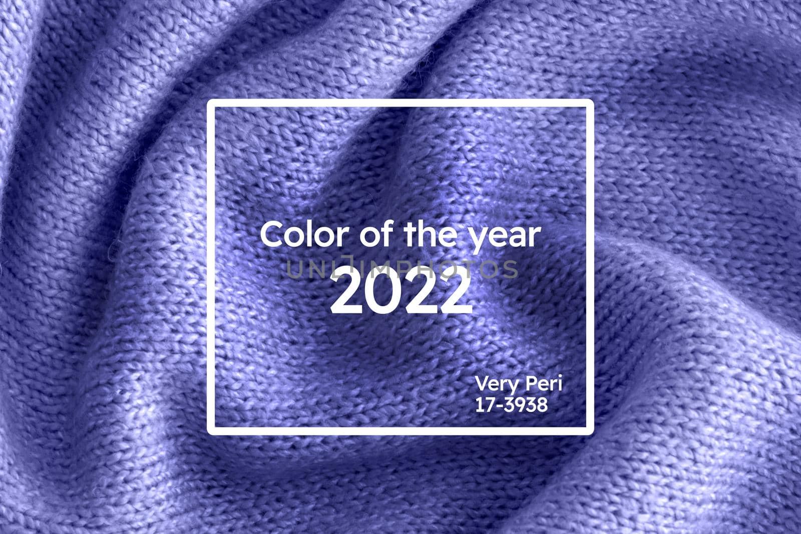 Color of the year 2022 soft knitted sweater texture closeup. Light violet blue abstract background. Trendy soft blue backdrop for web design. Luxury twisted fabric backplate