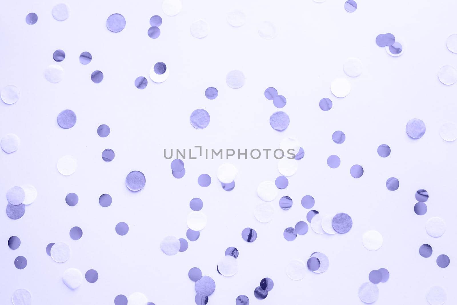 Violet and round confetti on a purple pastel background in very peri colors. Color of the year 2022. Template for advertising, blog, discounts and text.