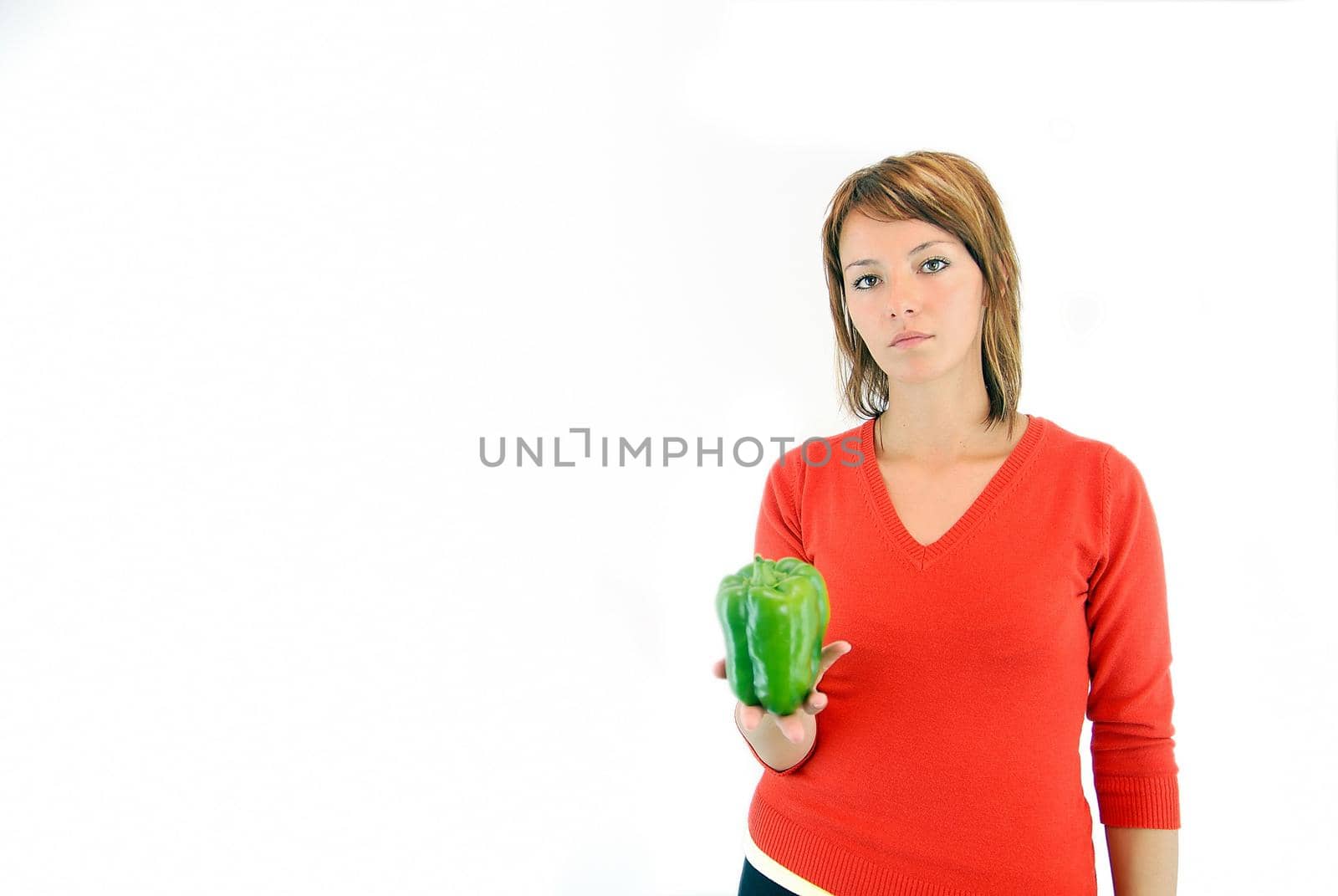 pretty girl with pepper isloated on white background