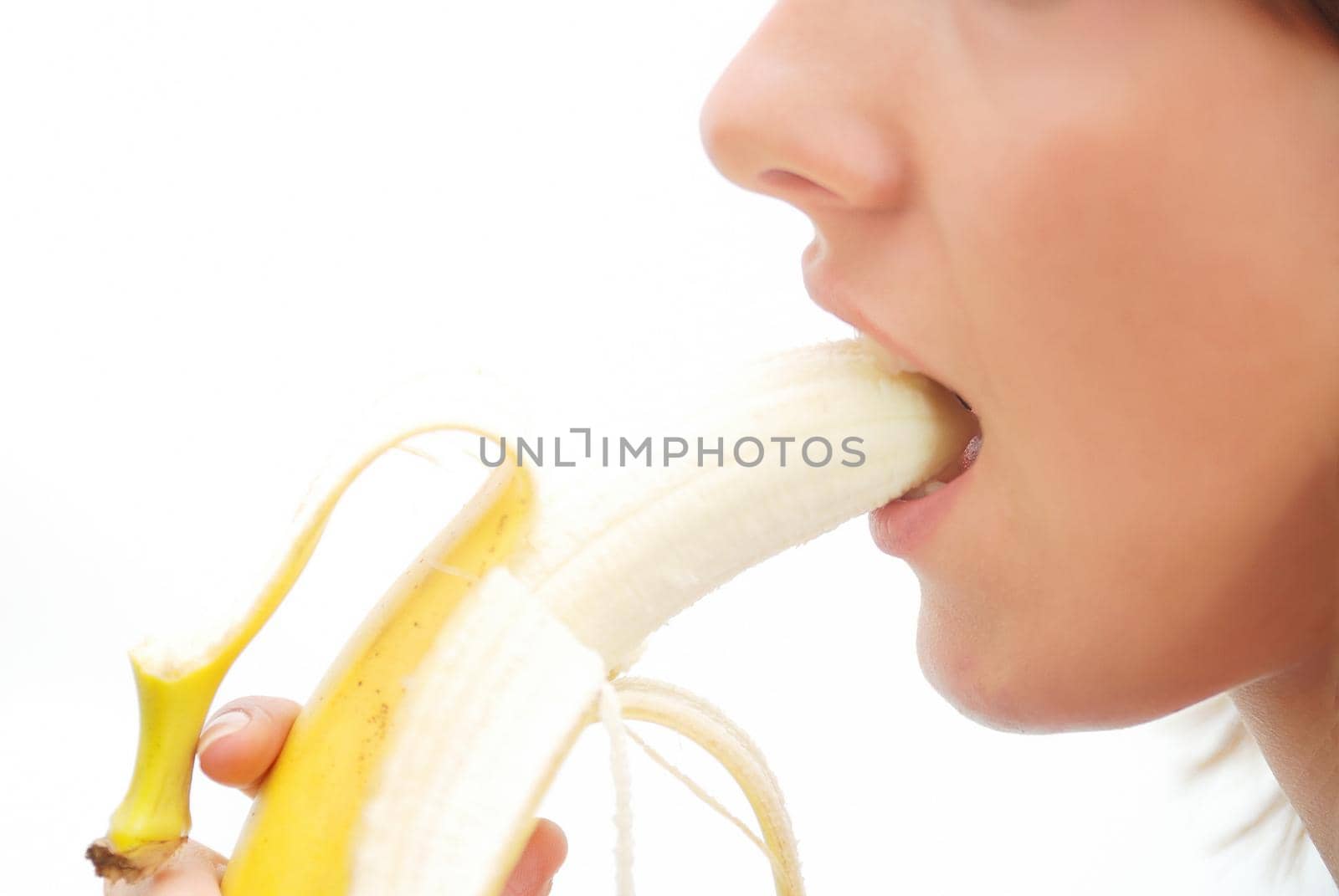 pretty woman eating banana