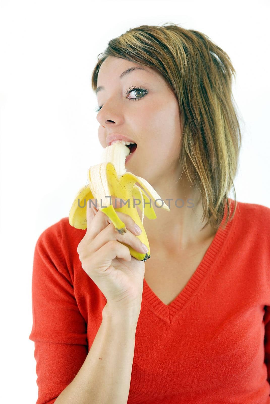 pretty woman eating banana