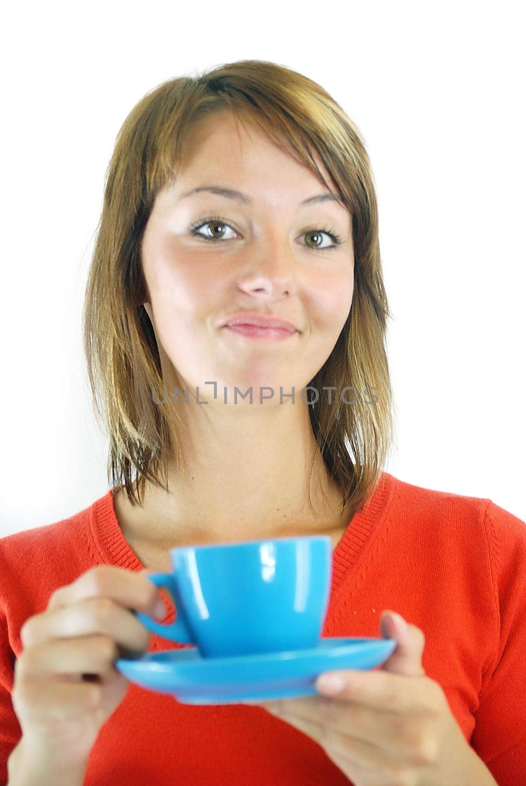 woman in red  hold blue cup of coffee 