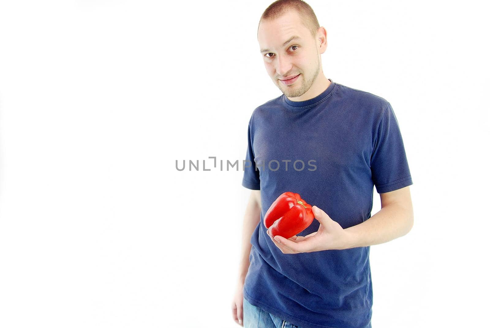 healthy young man with pepper isolated