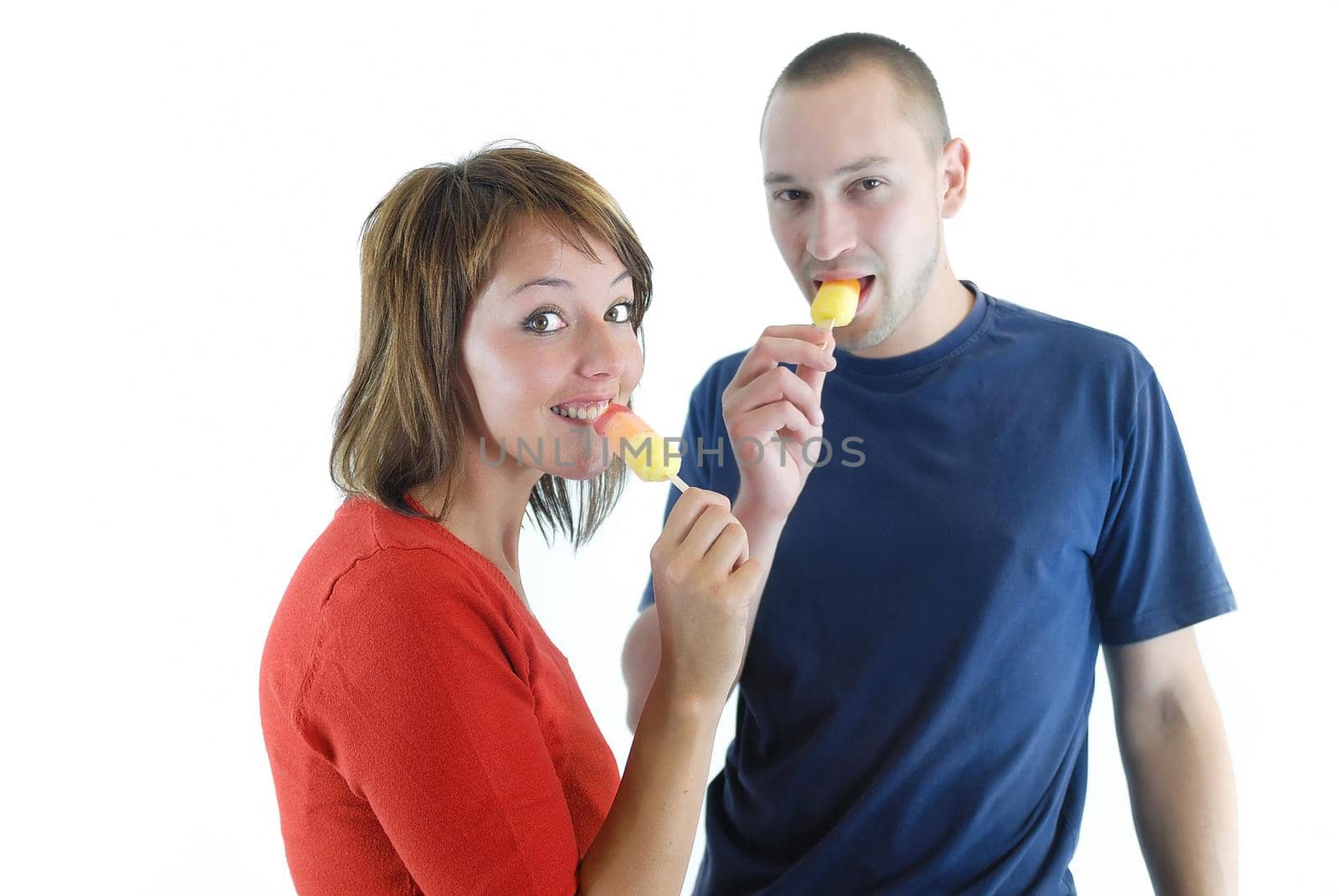 happy couple withe ice cream isolated on white background