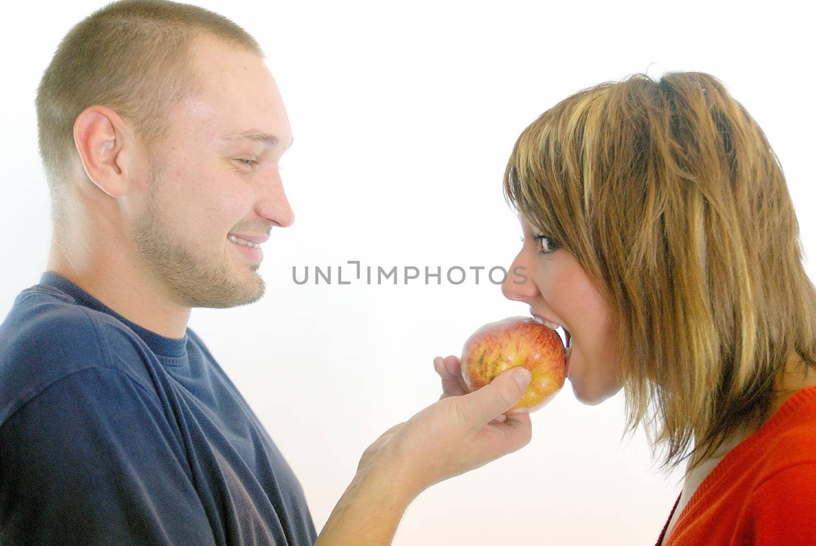 healthy couple with apple by dotshock